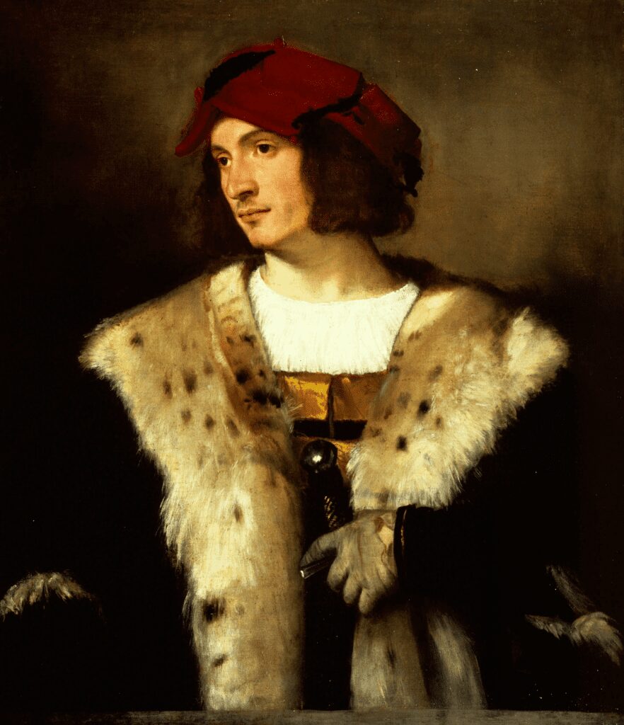 Portrait of a Man in a Red Hat by Titian (c. 1510s), showcasing the artist’s mastery of Venetian color techniques.